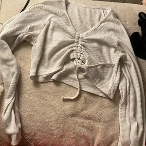 White long sleeve, slightly cropped.
